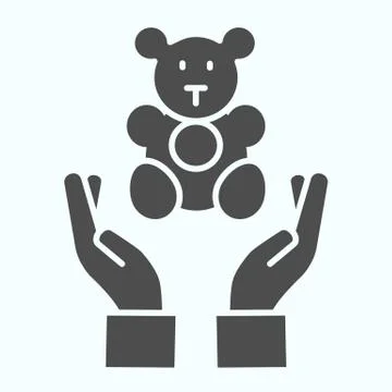 Toys donation in hands solid icon. Teddy-bear in two hands vector illustration Stock Illustration