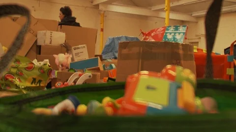 Toys &amp; Donations after a flood pull focus Stock Footage 112745883