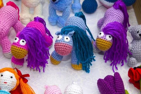 Toys made of knitted threads Stock Photos