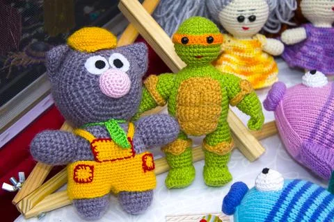 Toys made of knitted threads Stock Photos