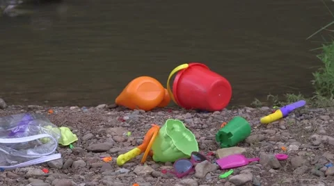 Toys on riverbed 02 Video stock 43386543
