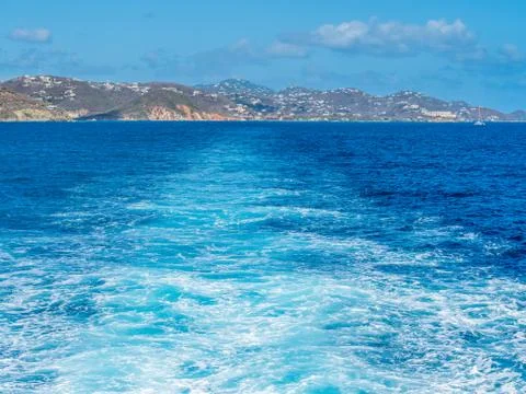 Trace of boat running from Red Hook marina at Sent Thomas at US Virgin Island Stock Photos