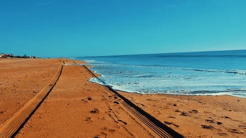 Trace from the car on the shore of the ocean Stock Footage 86121879