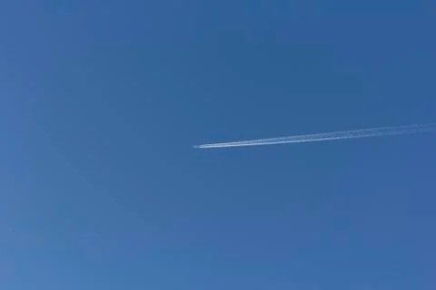 Trace of the plane in the sky Stock Photos