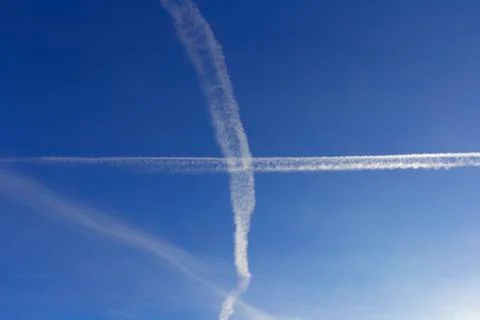 Trace of the plane in the sky Stock Photos