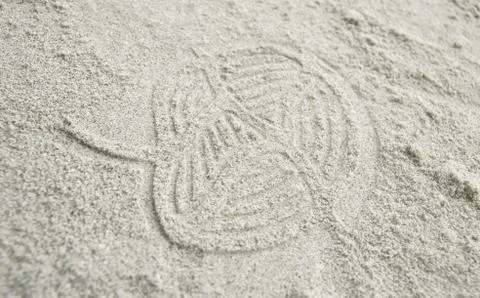 Trace on sand Stock Photos