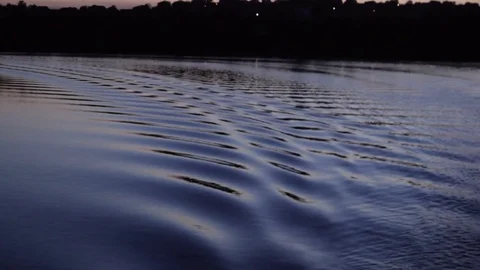 Trace of ship in the river at evening Stock Footage 70677022