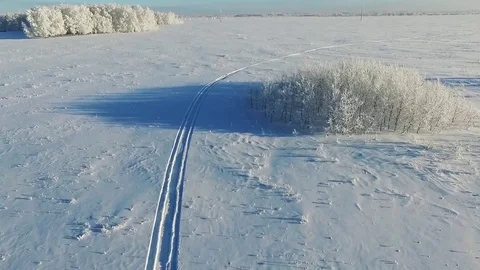 Trace from a snowmobile Stock Footage 71784030