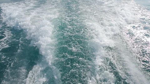Trace of speed boat on water surface Stock Footage 90783372