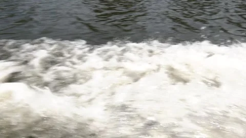 Trace tail of speedboat or ferry on water surface in the sea. Video stock 254324574