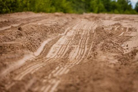 The trace of a tyre in the sand Photos