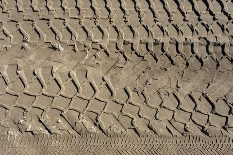 The trace of tyres in the sand Stock Photos
