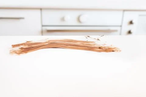 Traces of chocolate on the table Stock Photos