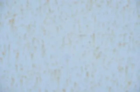 Traces of rust on blue metal. Stock Photos