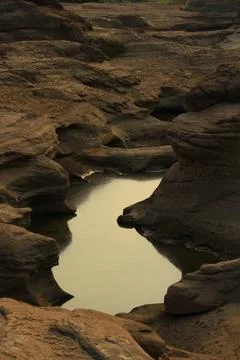 Traces of water eroded rocks. Stock Photos