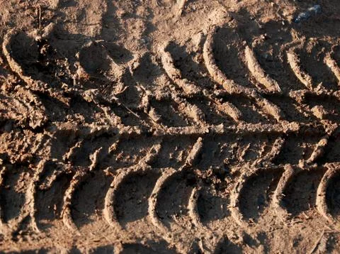 Traces of wheels in the mud Stock Photos