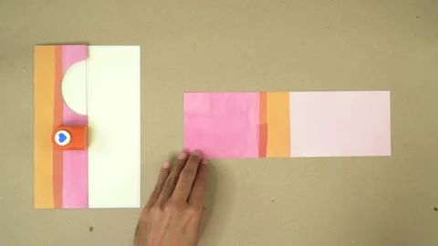 Tracing circumferences with compass on decorated paper for wish card Stock Footage 293314980