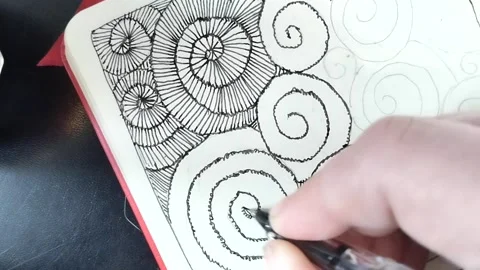 Tracing drawing of spirals and lines with fountain pen ink Stock Footage 277023473