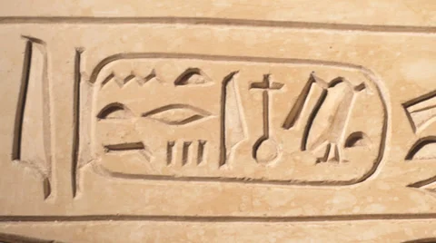 Track along carved ancient Egyptian hieroglyphics Stock Footage