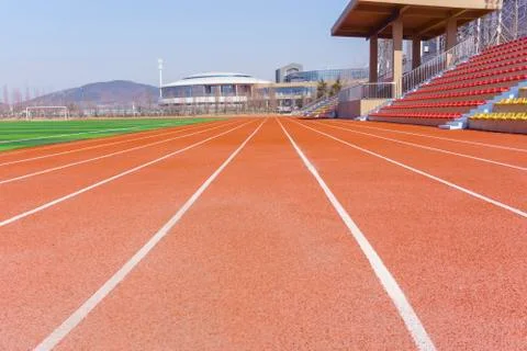 Track and field red plastic runway Stock Photos