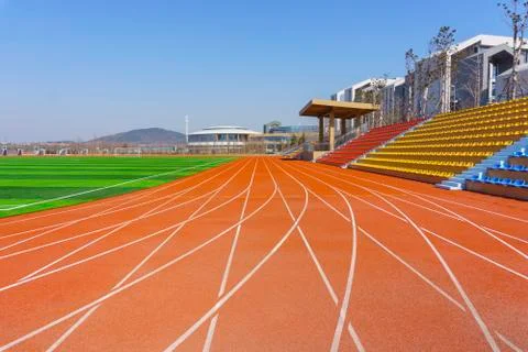 Track and field red plastic runway Stock Photos