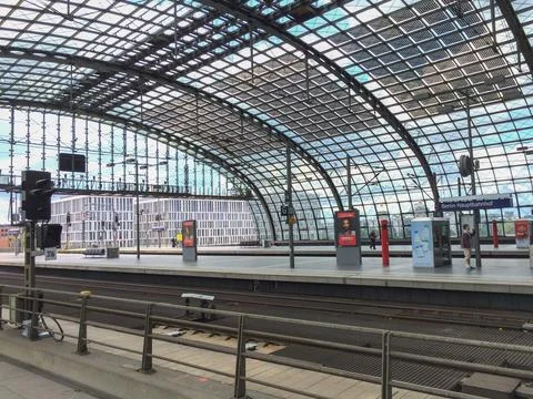 The track and the platform of the main train station Berlin, Germany. Stock Photos