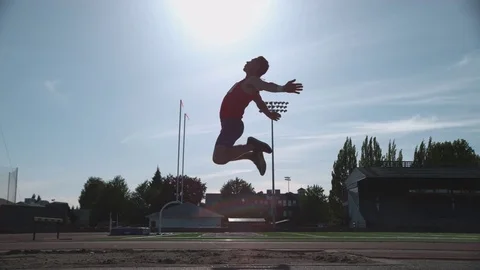 Track athlete doing long jump in super slow motion, shot on Phantom Flex 4K Stock Footage
