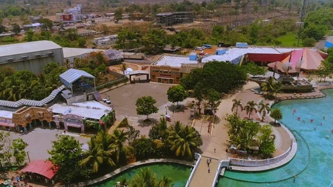 Track back view of buildings and swimming pool Stock Footage 91742665
