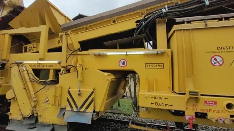 Track construction work on the railway line, track - ballast cleaning Stock Footage 305320010