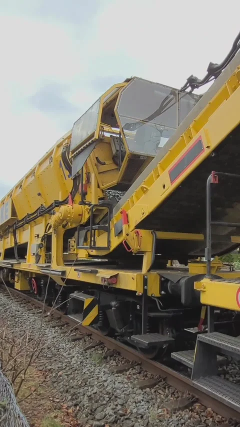 Track construction work on the railway line, track - ballast cleaning Stock Footage 305320199