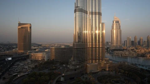Track left past base of Burj Khalifa at 60m. Stock Footage 98950812
