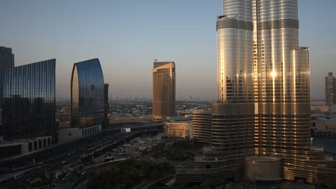Track left past base of Burj Khalifa at 60m. Stock Footage 98952099