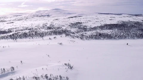 Track out from snowy mountain Stock Footage 73059891