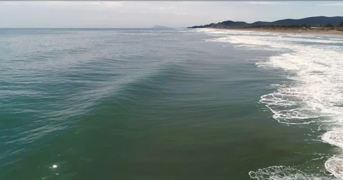 Track parallel drone flight laterally with foam Stock Footage 124375487