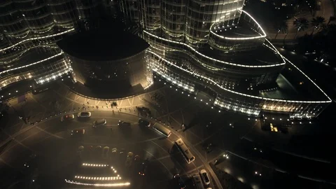 Track right while paning up from Burj Kahilfa entrance at 100m. Stock Footage 98962702