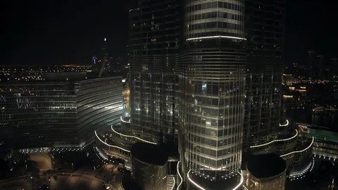 Track right while paning down from Burj Kahilfa entrance at 100m. Stock Footage 98962381
