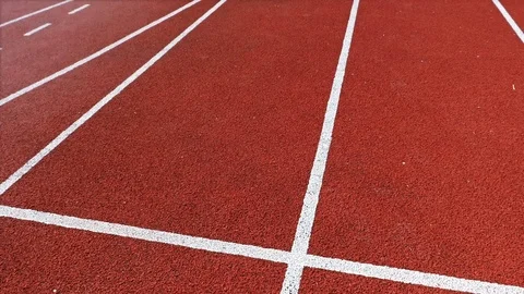 Track runner boy teenager preparing to run at starting line, 4k Video stock 80474836