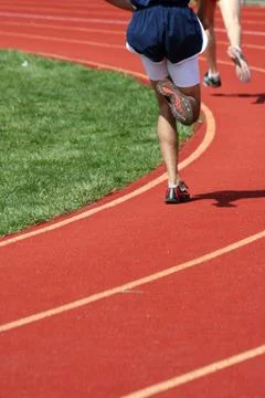 Track runner Stock Photos