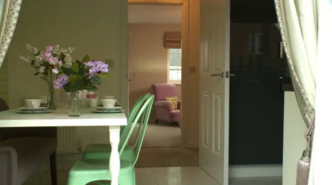 Track through dining room in modern home Stock Footage 35753893