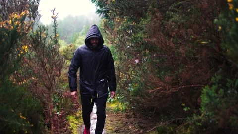 Track trail through mountains walking by muddy paths after rain amidst nature Видео 237691354