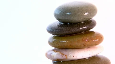 Track onto wet zen stones Stock Footage