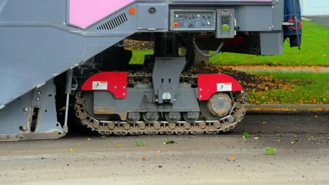 Tracked construction machine, asphalt paver or road milling machine. Metal Stock-Footage 309365151