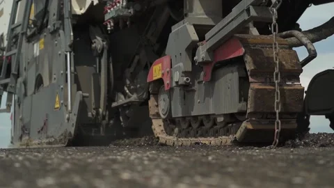 Tracked road milling machine in motion on the road. closeup Stock-Footage 145466046