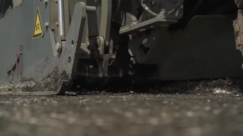 Tracked road milling machine in motion on the road. closeup Stock Footage 145466048