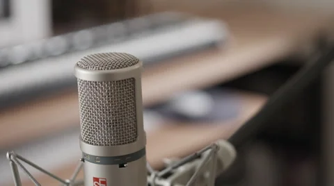 Tracking across expensive microphone - medium closeup Stock Footage 50245802