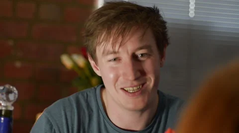 Tracking Across Man Talking on a Date Stock Footage 59356285