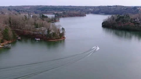 Tracking Aerial of Boat Cruising on Lake Lanier Georgia GA US Stock Footage