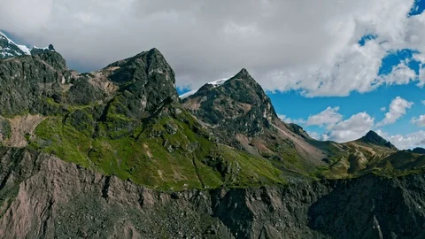 Tracking aerial of two stark mountains in Ausangate, Peru Stock Footage 115371194