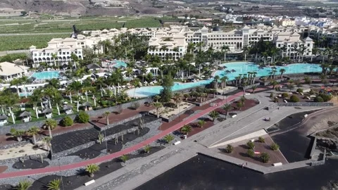 Tracking Aerial view of Gran Meliá Palacio de Isora in Tenerife Stock Footage 240654972
