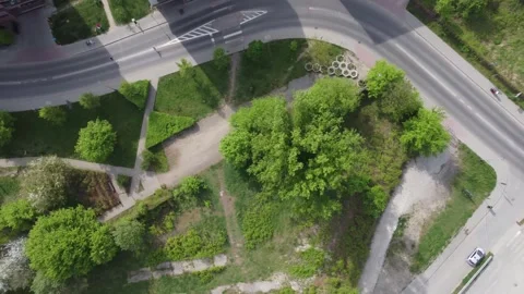 Tracking aerial view of two runners racing during the Krakow Marathon (2024) Stock Footage 272676099